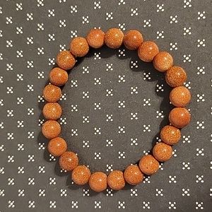 Orange red Goldstone crystal bead 8mm bracelet